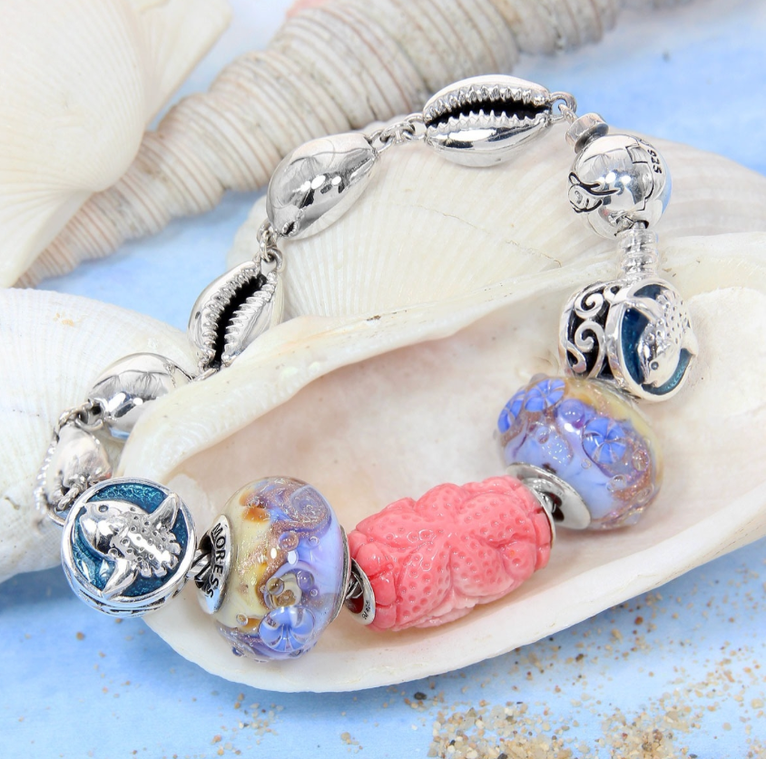 Moress -CONCH SHELL CARVED BEAD – ROSES & STARFISH