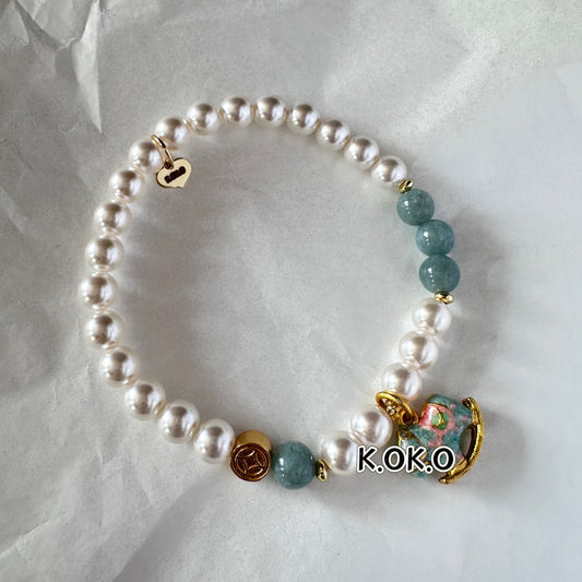 KOKO Vintage Charm Shell Pearl Bracelet with Enamel Rocking Horse