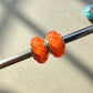 PRAAN Sun Orange Cat Eye Twisted Rope Stopper Charms