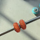 PRAAN Sun Orange Cat Eye Twisted Rope Stopper Charms
